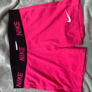 NIKE pros hot pink with black waistband